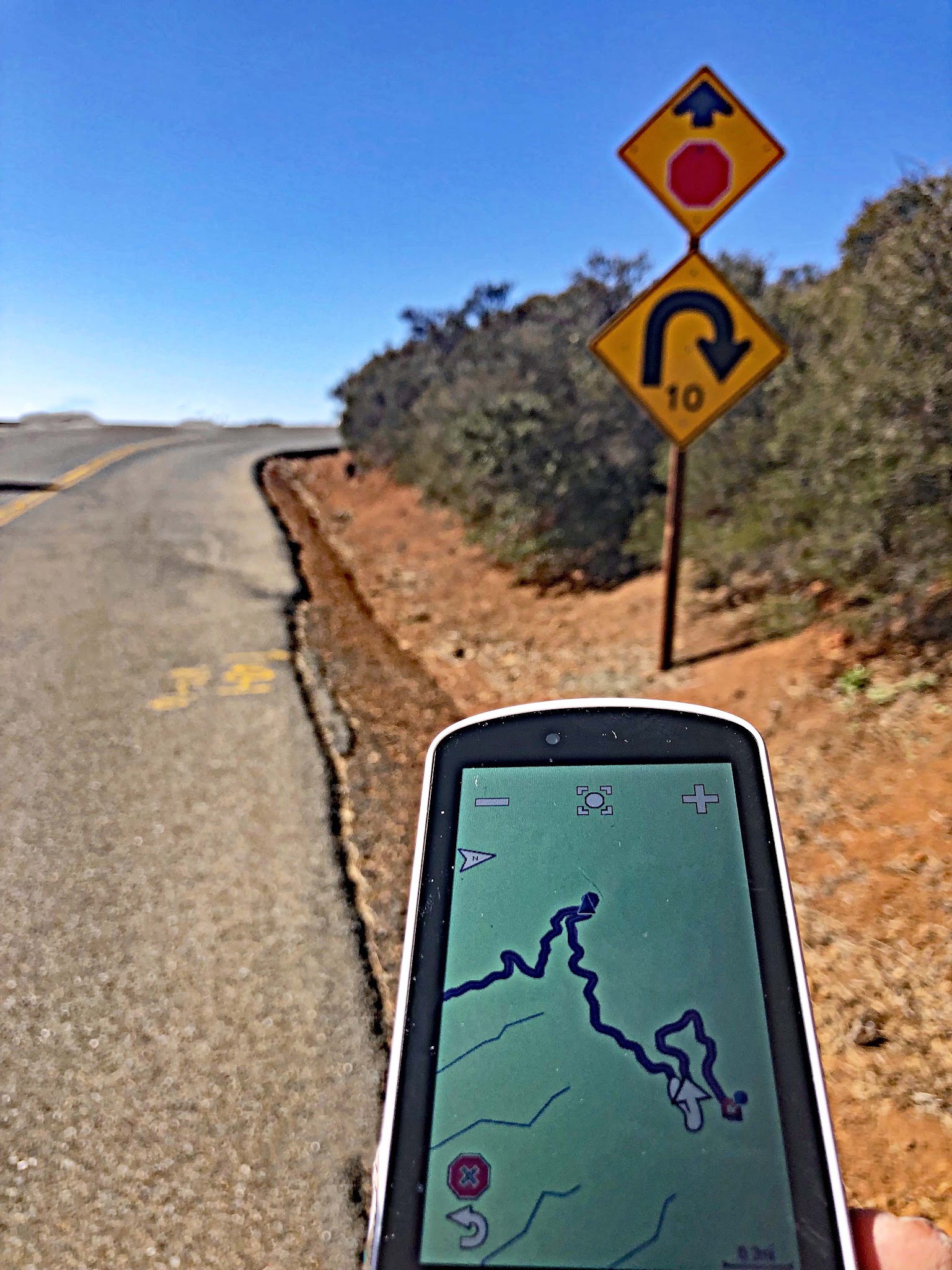 Cycling Mt. Diablo - Summit Road - road sign for curve - garmin map with hairpins
