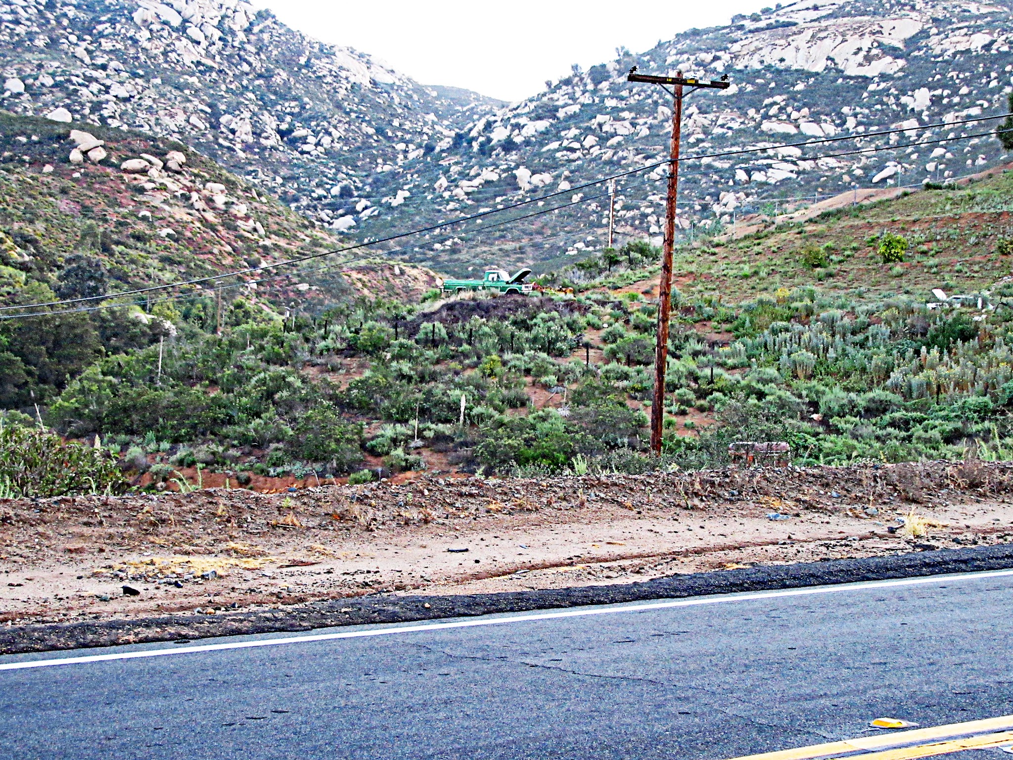 Bike ride up Honey Springs Road - abandon truck with hood up on hill