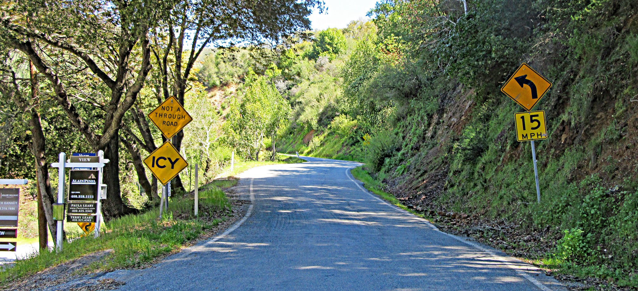 Climbing Soda Springs Road by bike - start, roadway signs, road, 