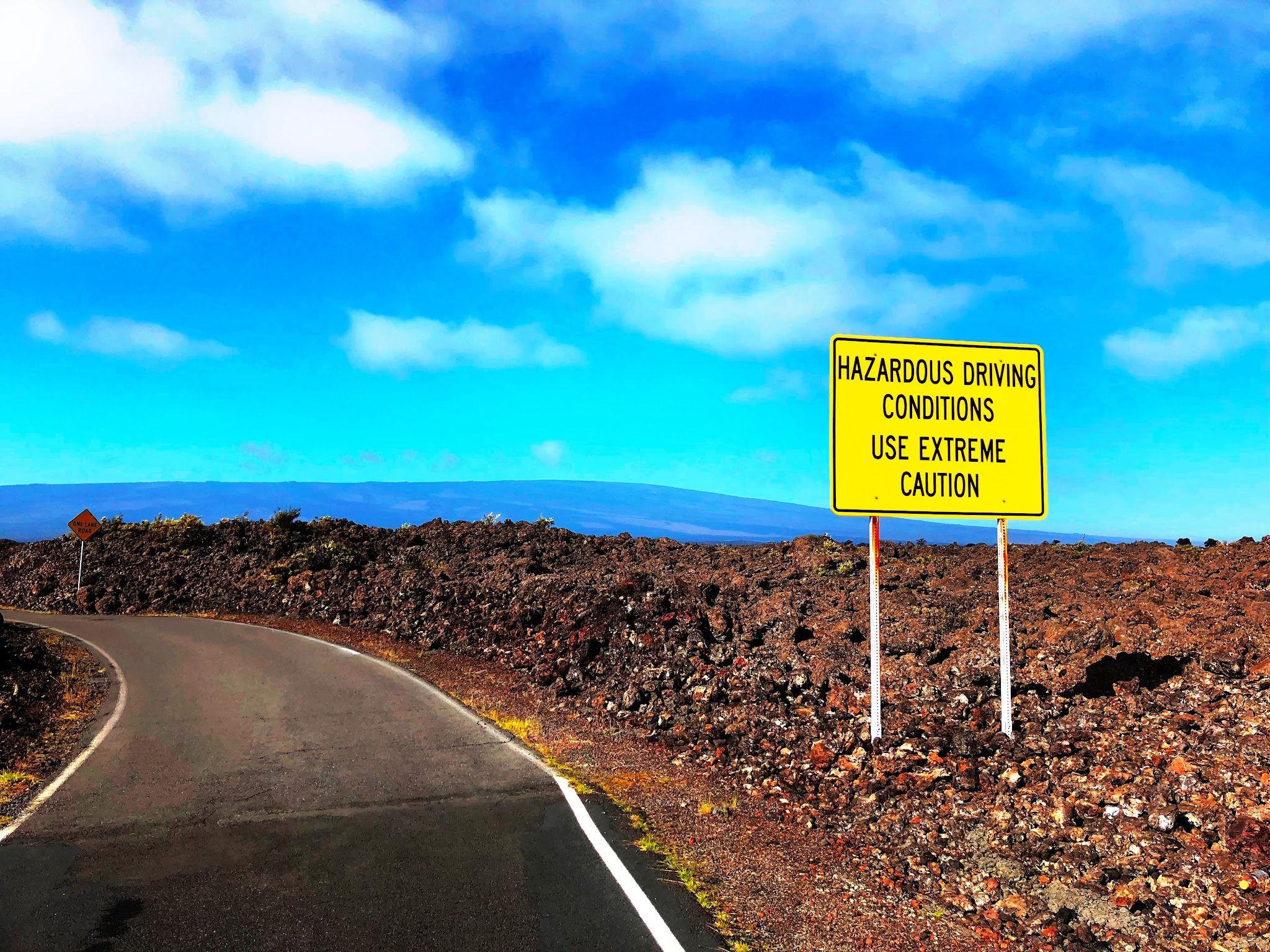 Mauna Loa Observatory hazard sign on bike climb to the summit