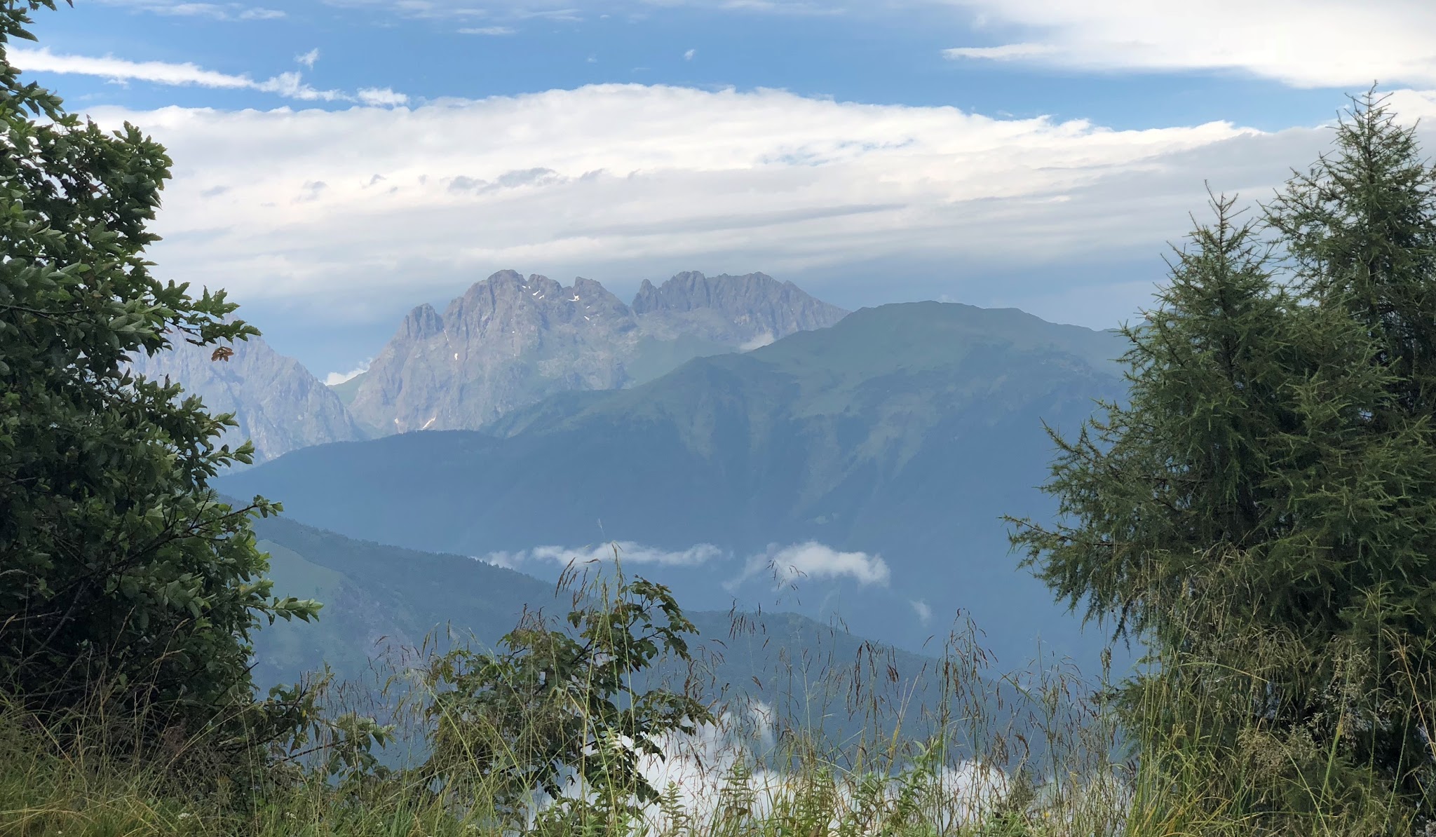 Passo della Forcella Climbing Passo della Focella by bike - view of Italian Alps.