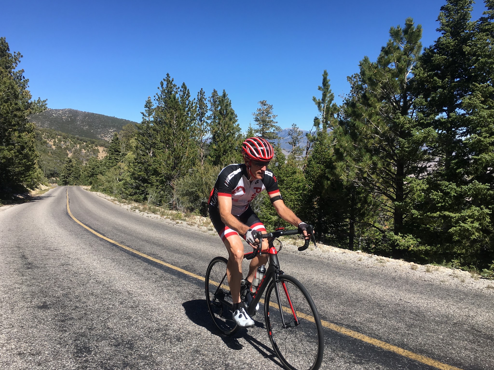 Bike climb of Wheeler Peak - cyclist on road