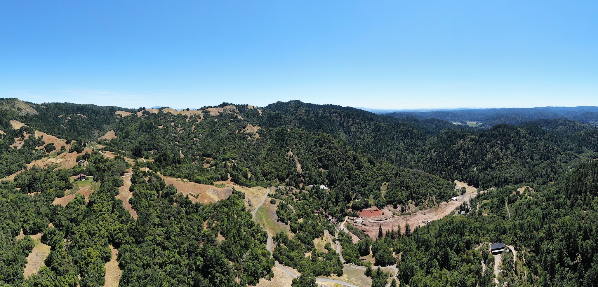 Climbing Sweetwater Springs Road by bike - aerial drone photo of Mercury Mine and road