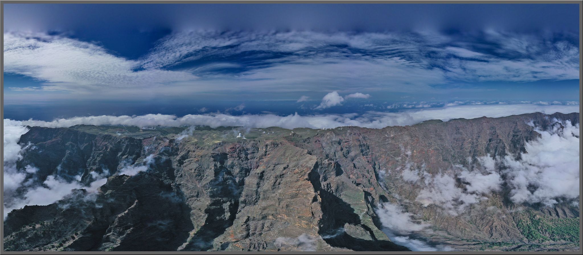 panoramic view of coastline from Roque de los Muchachos west climb