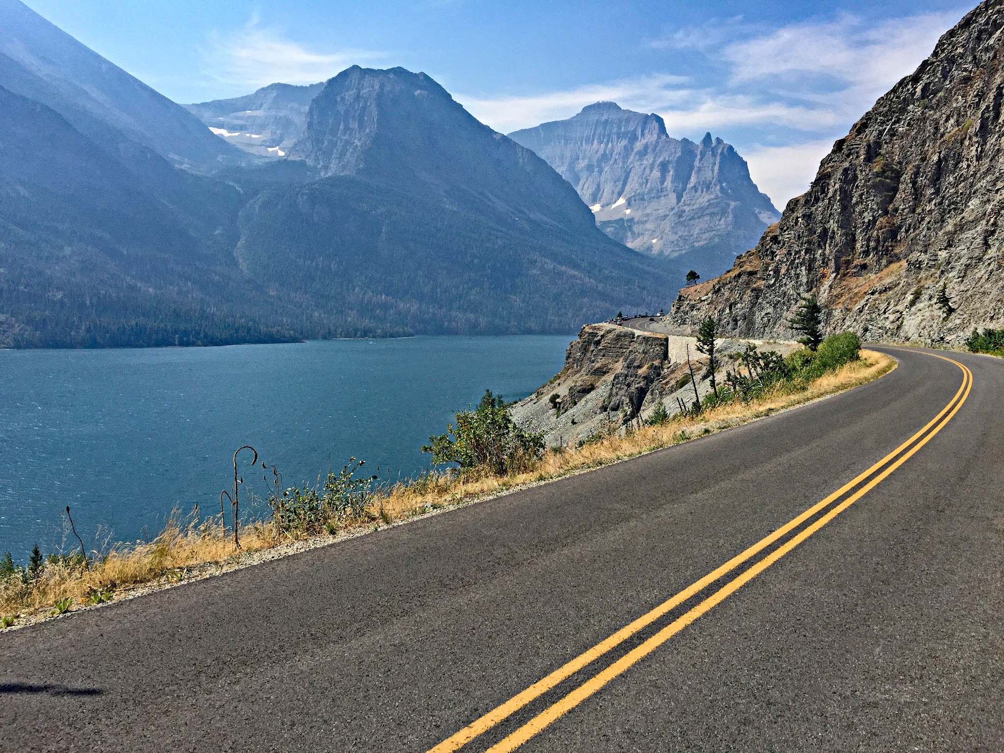 Cycling Logan Pass East, Going-to-the-Sun Road, Glacier National Park - Saint Mary Lake along roadside