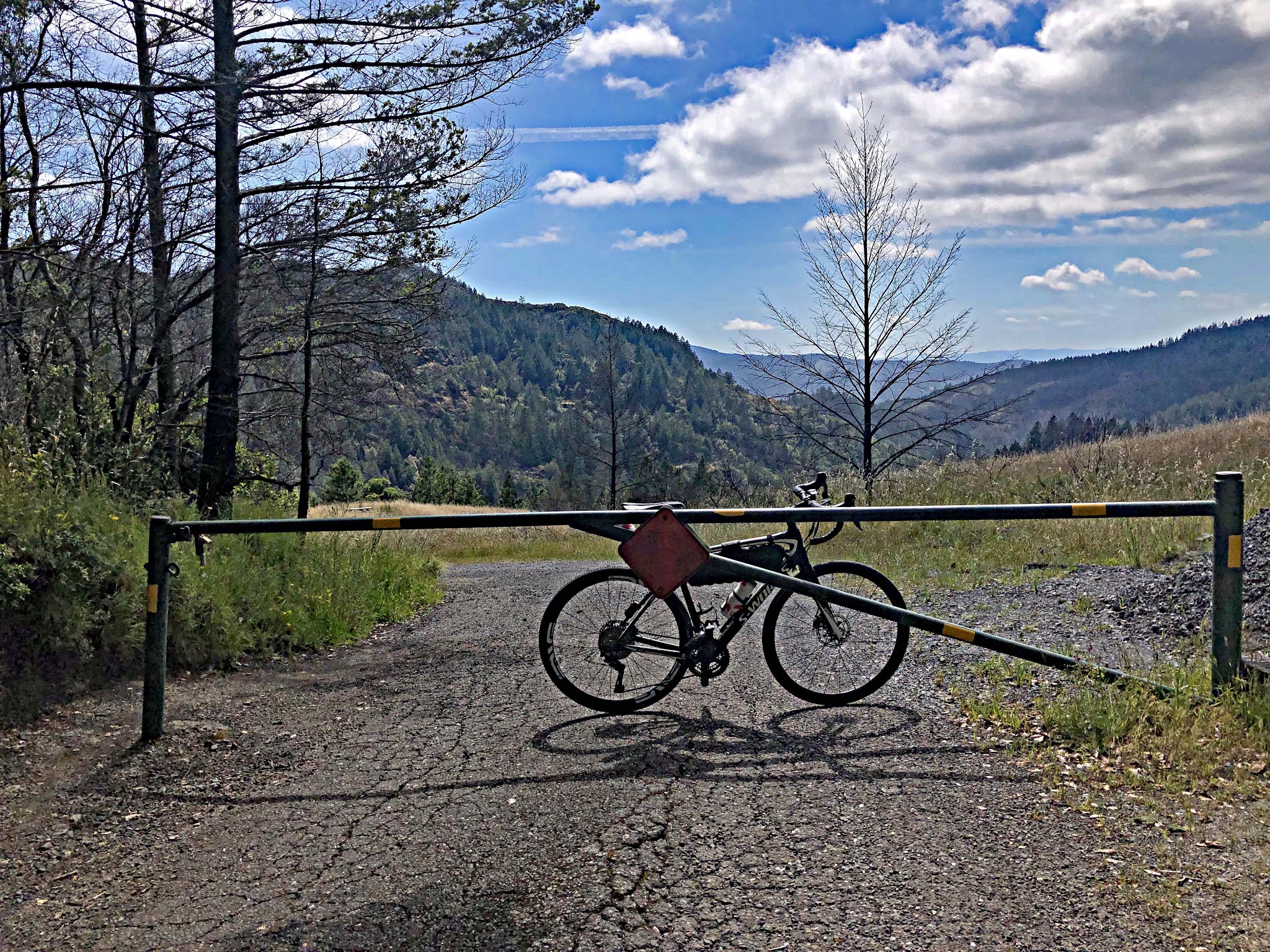 Climbing Bald Mountain by bike - gate at end of gravel section