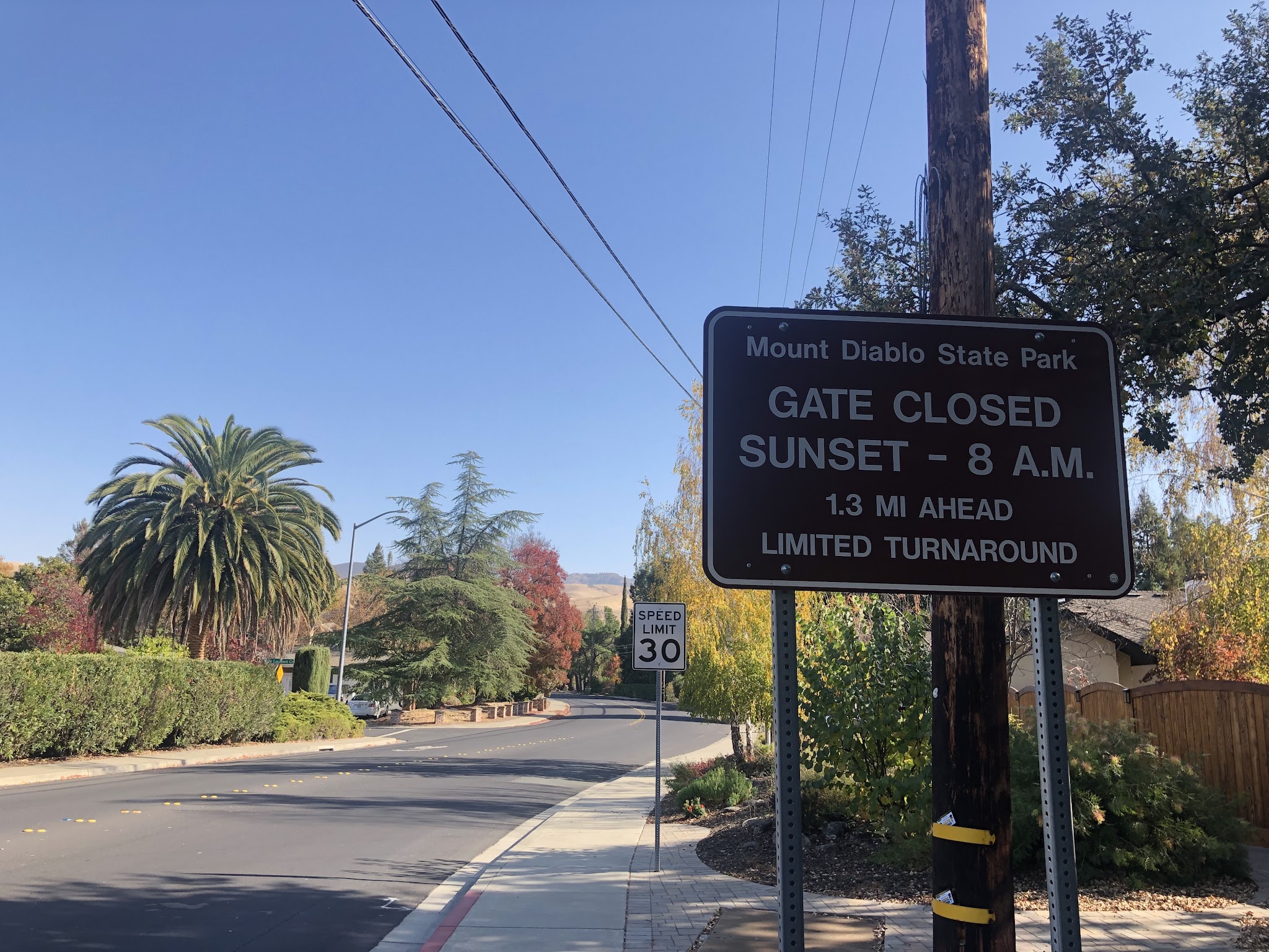 Sign reads "Gate Closed Sunset - 8AM"