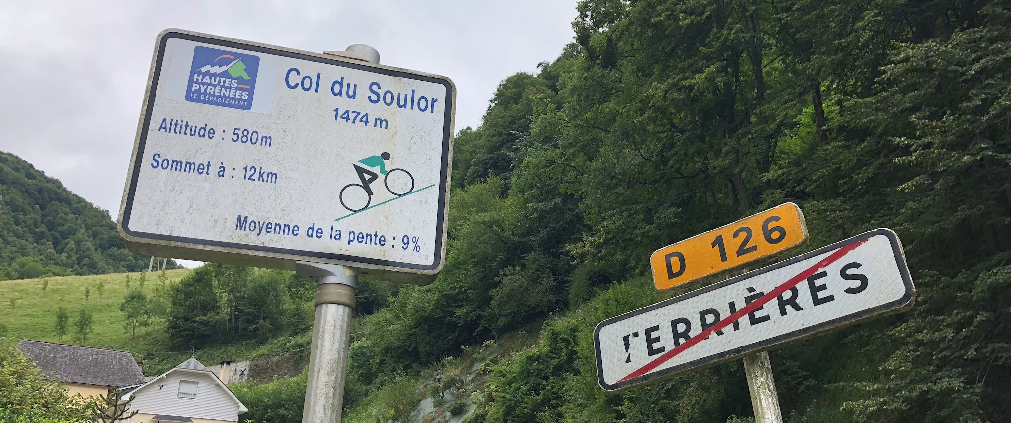 cycling Col du Soulor from Ferrieres - kilometer marker sign - km 12
