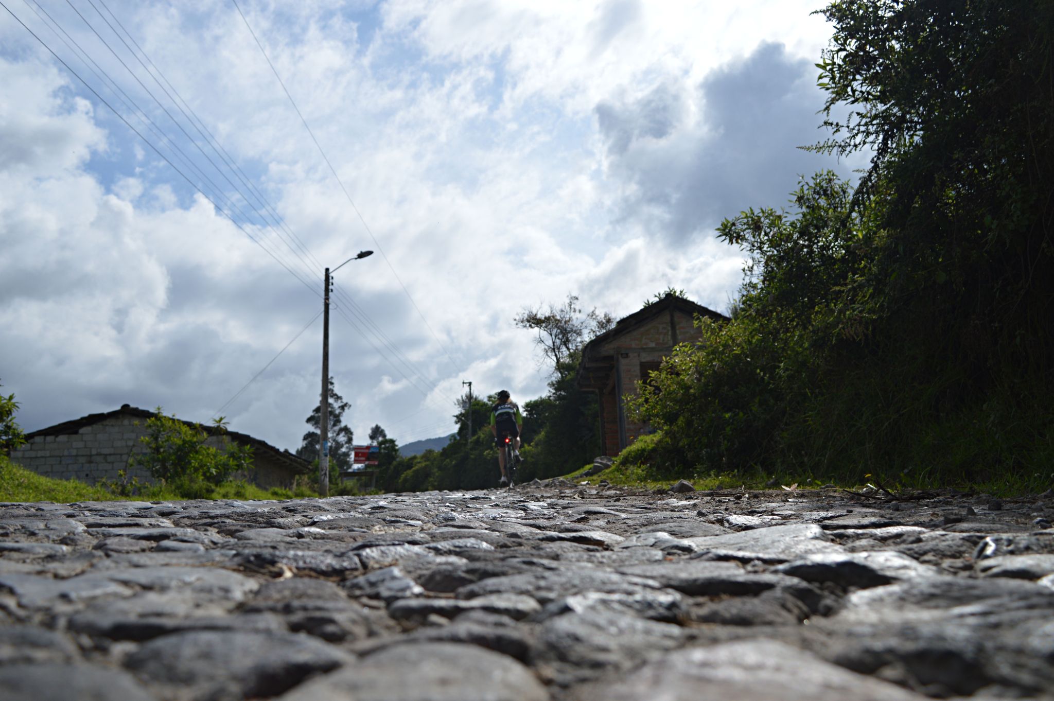 Cycling Lagunas de Mojanda, Ecuador - up close view of cobblestone roadway