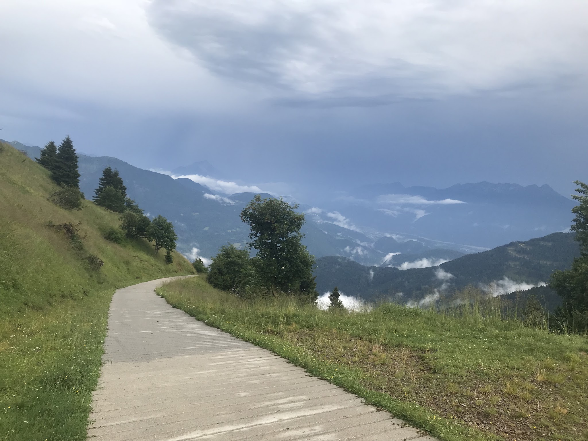 Climbing Passo della Forcella by bike - cement roadway at end.
