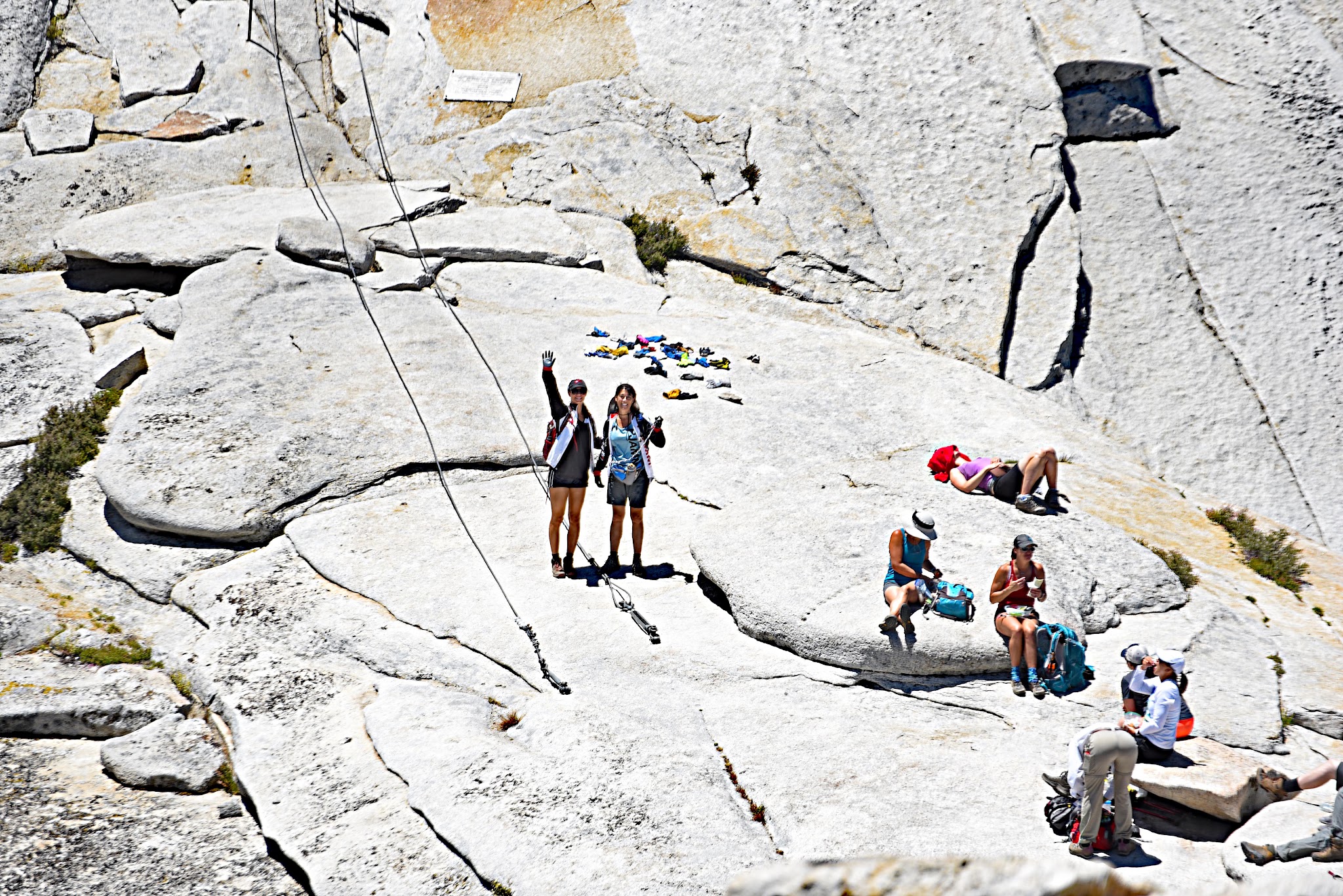 Yosemite Valley to Glacier Point to Half Dome - climbers at the bottom of Half Dome, cables