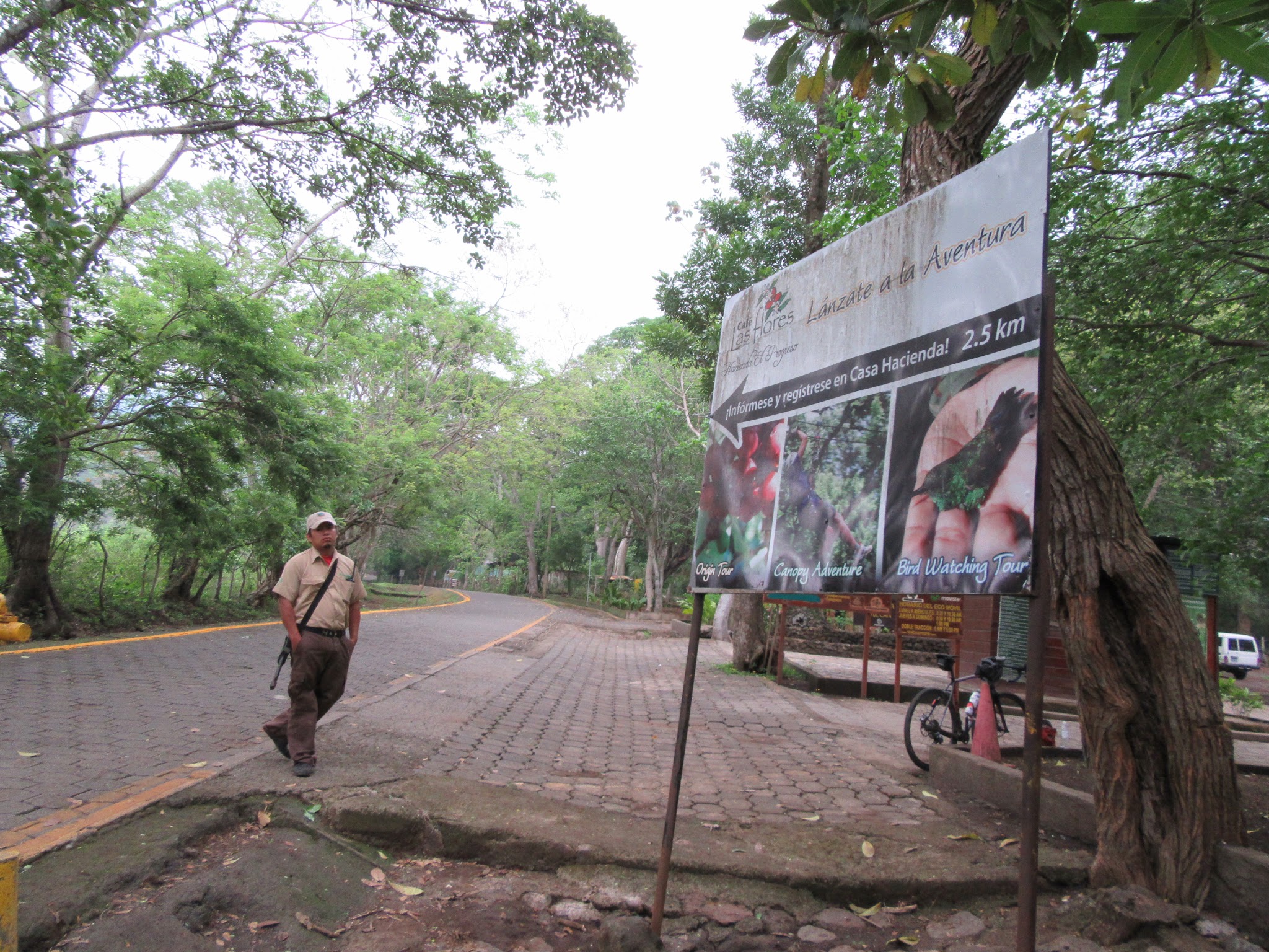 Mombacho Volcano - he means business Bicycle ride up Mombacho Volcano - guard with rifle