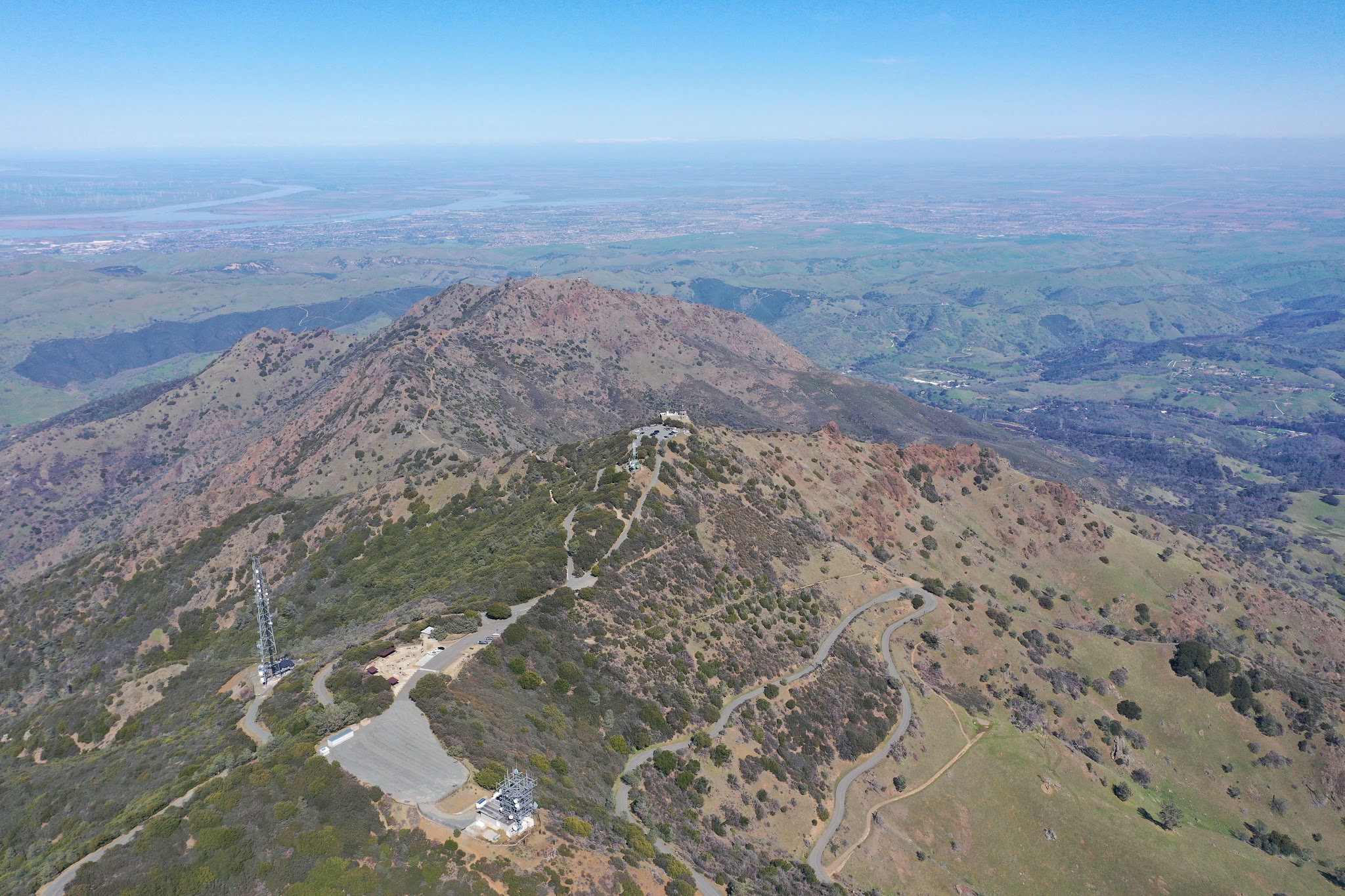 Cycling and riding by bike Mt. Diablo - aerial drone photo of Summit Road, visitor center, beacon and observation deck