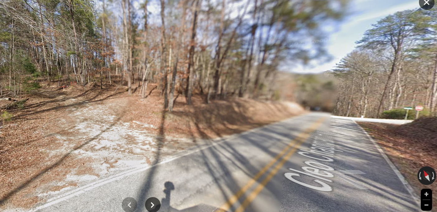 A road with trees and a road

Description automatically generated