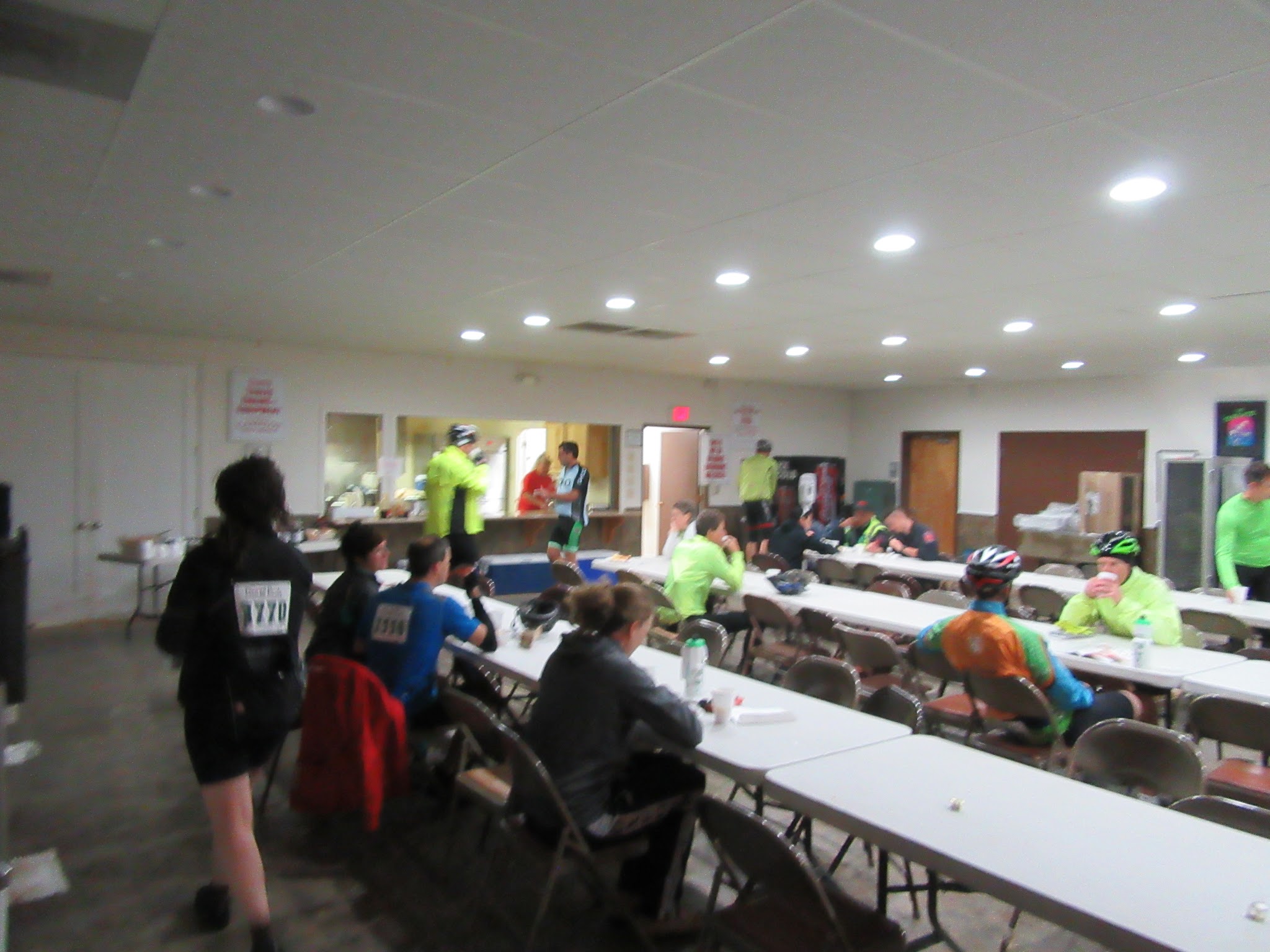 cyclists eat a pancake and egg breakfast before beginning the Death Ride