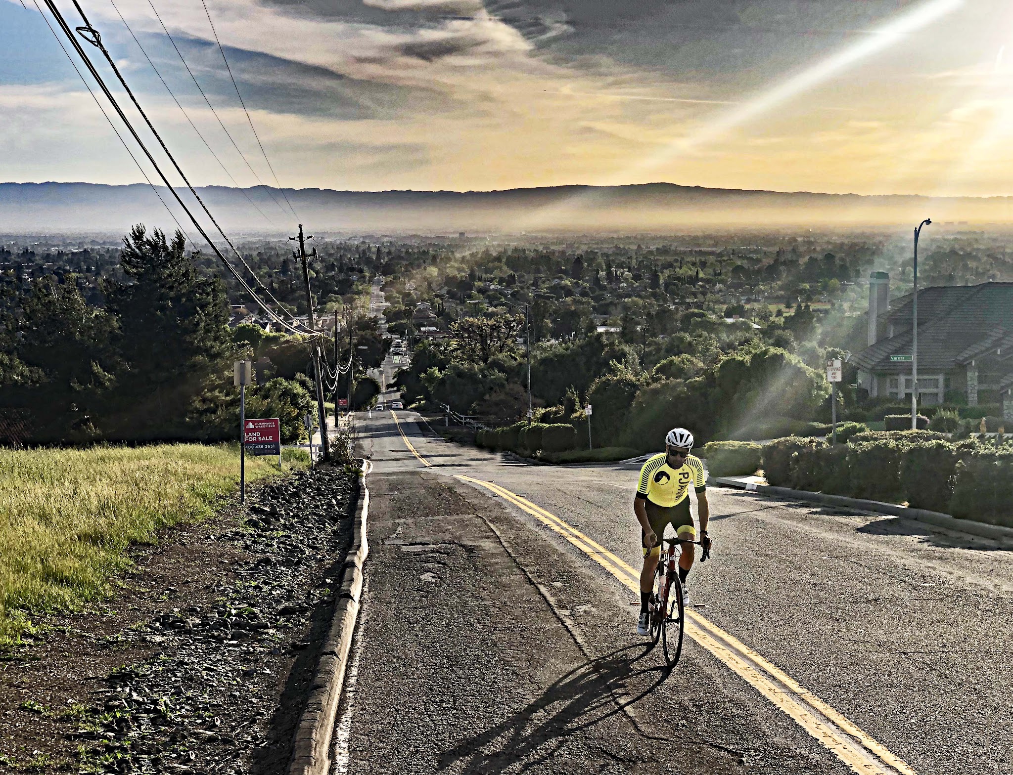 Riding bike up Sierra Road  - view of start and road - PJAMM Cycling cyclist on bike