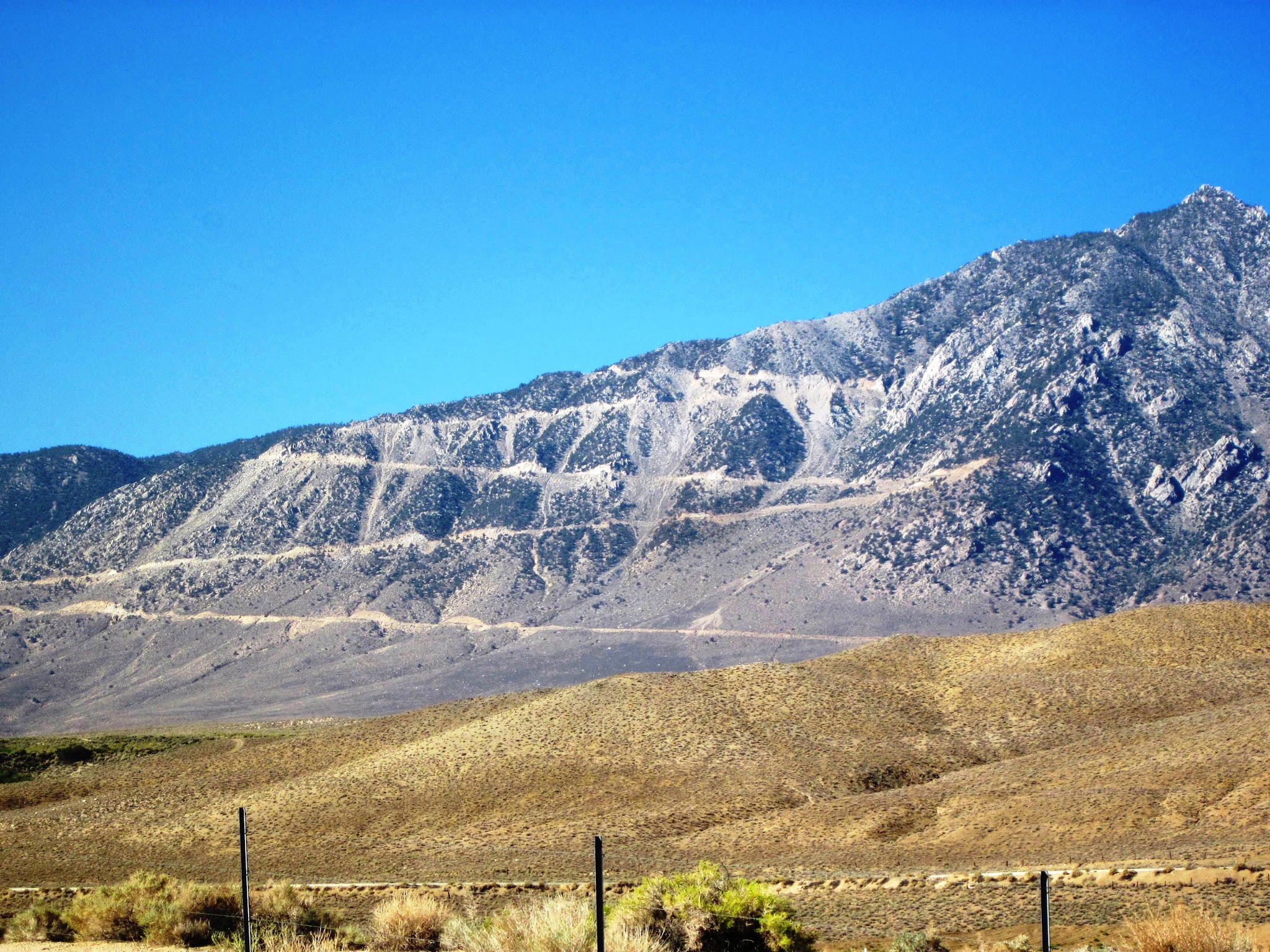 Photo taken from Highway 395 just south of Lone Pine, shows switchbacks up the mountainside on Horseshoe Meadow Road