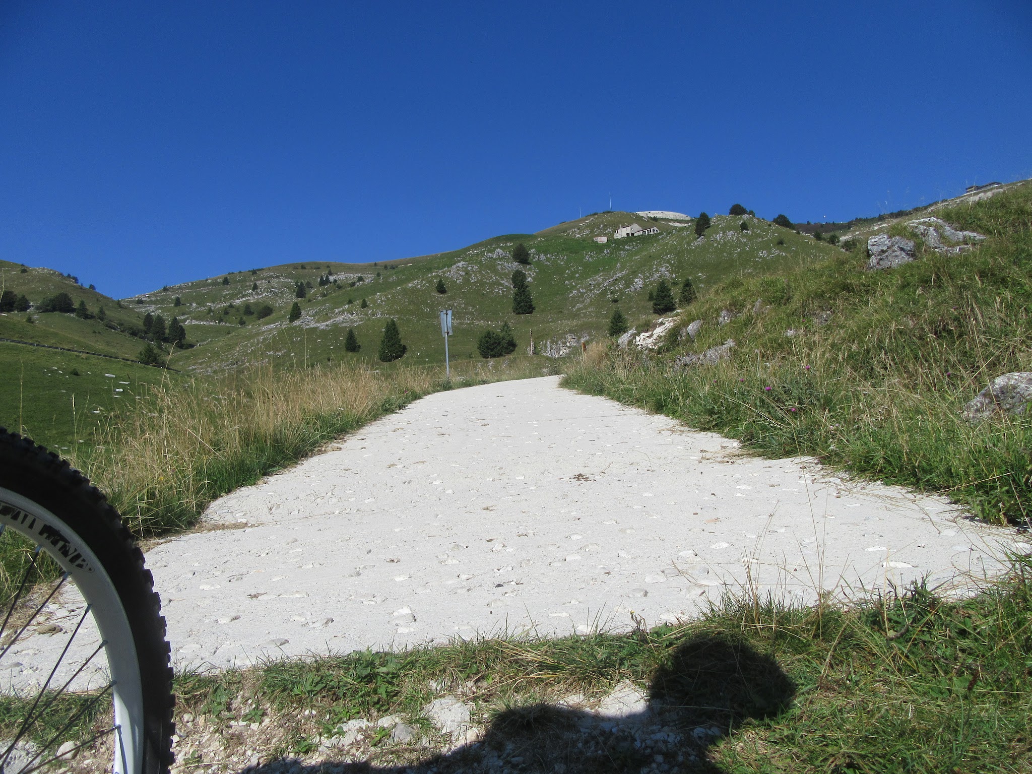 Climbing Monte Grappa from Crespano by bike - start of pavement