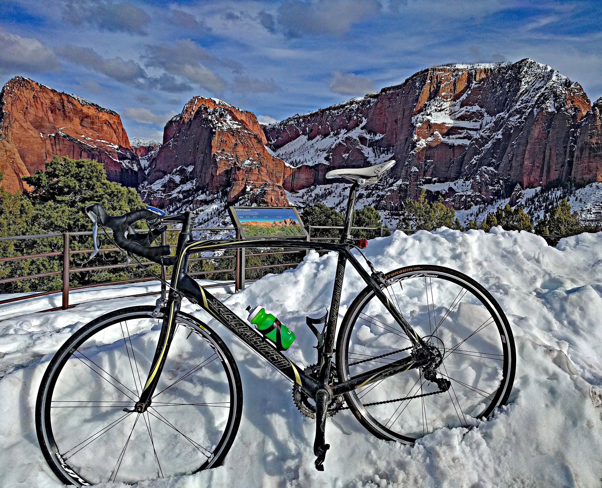 Cycling Kolob Terrace - bike on snowbank 