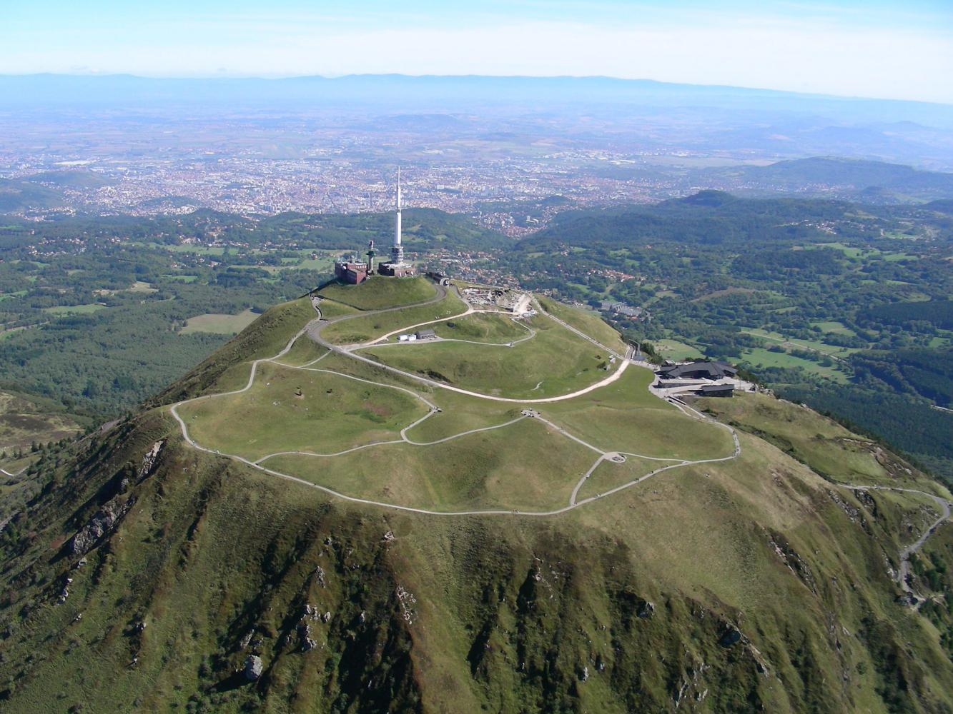 aerial drone view shows climb finish at top of Puy Dome, radio tower