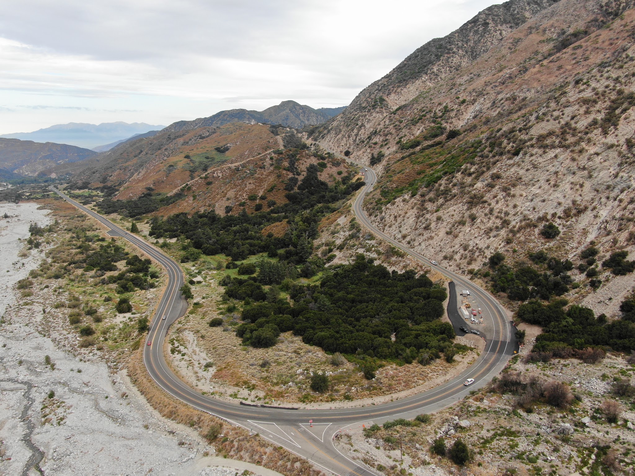aerial drone view shows hairpin turn at the Valley of Falls exit