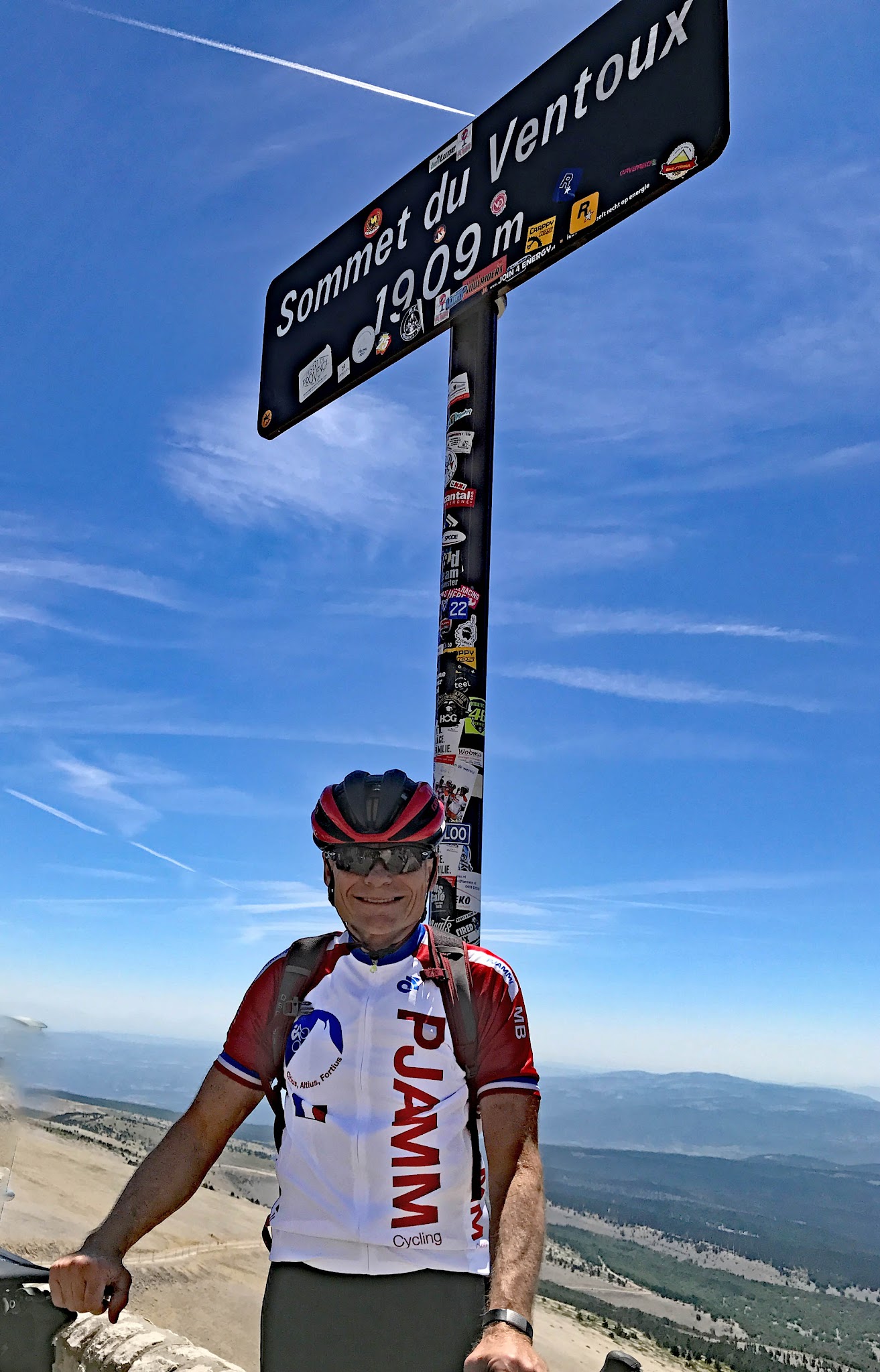 Bike Climb Mont Ventoux - John Johnson PJAMM Cycling with bike at summit sign