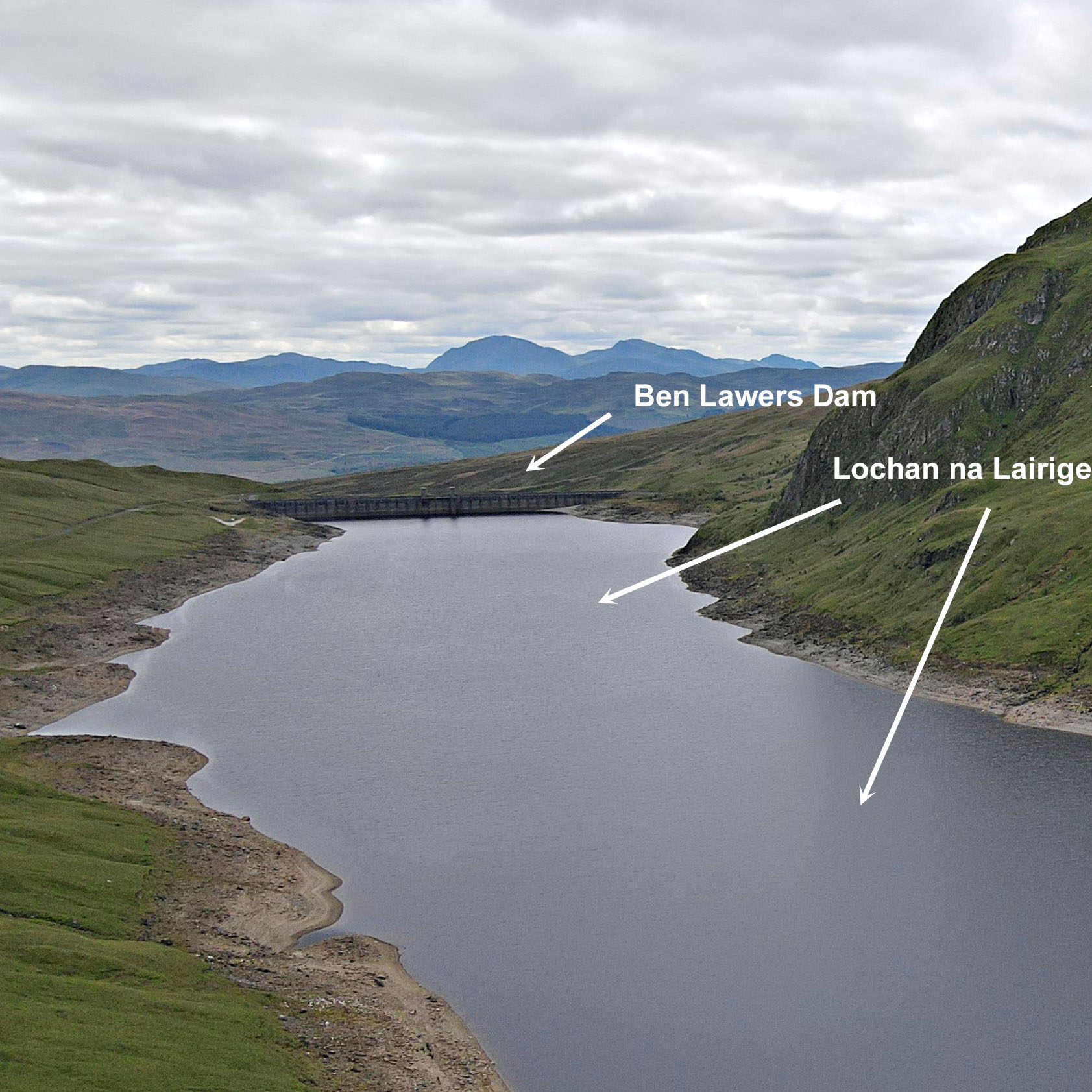 aerial drone view shows Ben Lawers Dam and Lochan na Lairige