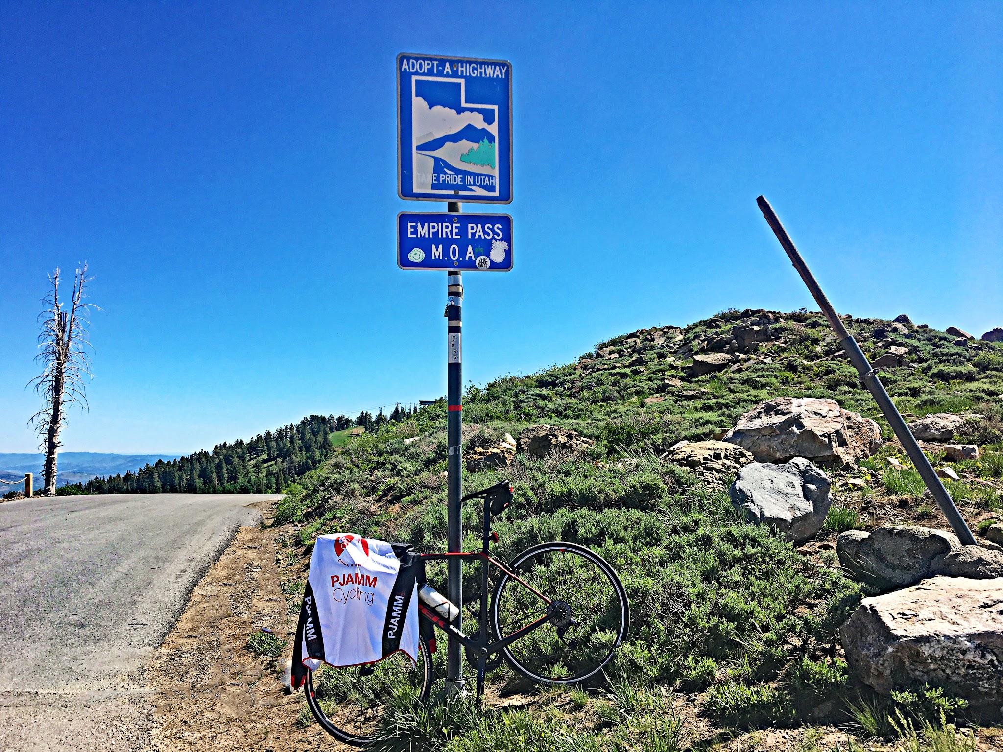 cycling Empire Pass from Midway - pass sign, bike, pjamm jersey